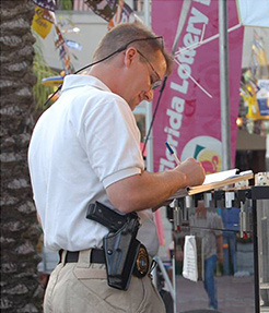 World Lottery Association Security Officer taking a report